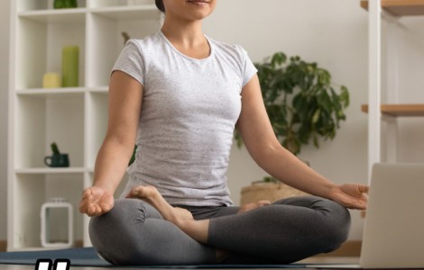Woman sitting in meditative pose