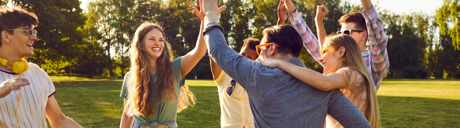 group of friends high fiving