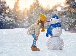 girl-and-snowman