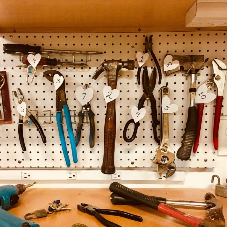 tools on pegboard wall