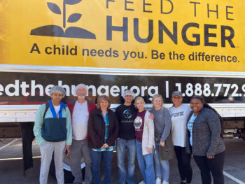 staff outside the feed the hunger truck